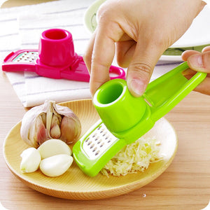 https://happybeingwell.com/cdn/shop/products/IVYSIHON-Plastic-Mini-Grinding-Grater-Planer-Slicer-Cutter-Kitchen-Tool-Supplies-Garlic-Press-Multi-functional-Stainless_4af8f761-a9ba-4cea-b3bc-24cba9e00c04_300x300.jpg?v=1599586276