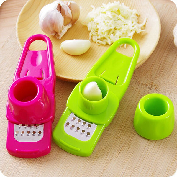 https://happybeingwell.com/cdn/shop/products/IVYSIHON-Plastic-Mini-Grinding-Grater-Planer-Slicer-Cutter-Kitchen-Tool-Supplies-Garlic-Press-Multi-functional-Stainless_grande.jpg?v=1599586276